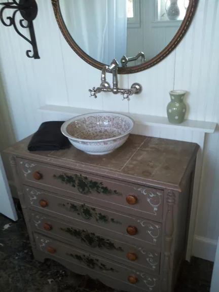 Vessel sink on a converted dresser vanity
